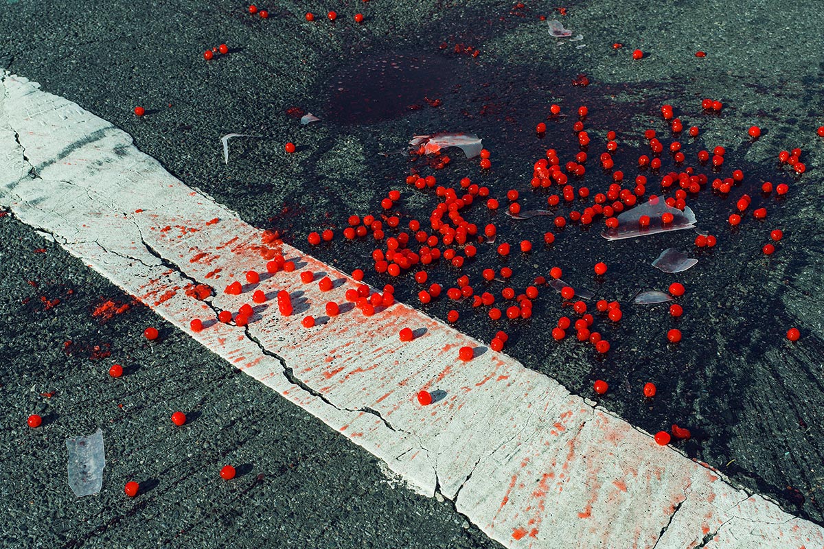 Cherries spilled on crosswalk, New York City, USA, 2014 © Christopher Anderson / Magnum Photos