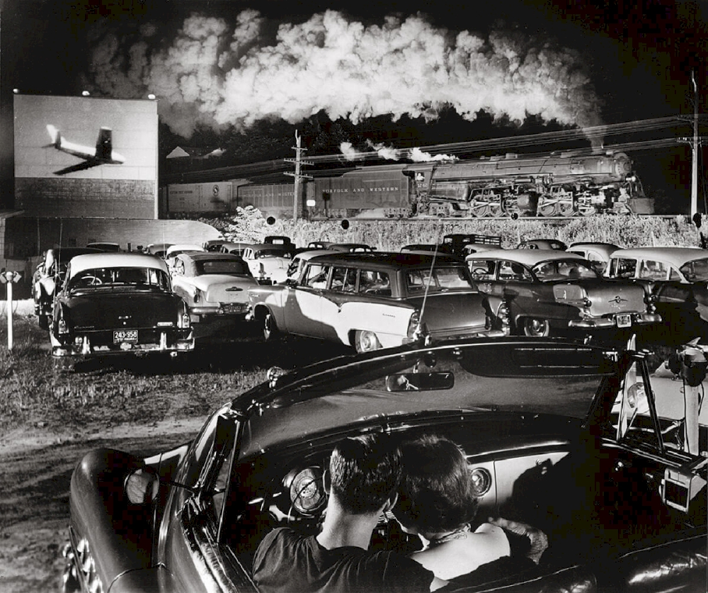 HOTSHOT EASTBOUND AT THE IAEGER DRIVE-IN Iaeger, West Virginia, 1956 © O. Winston Link / O. Winston Link Museum, Roanoke, Virginia