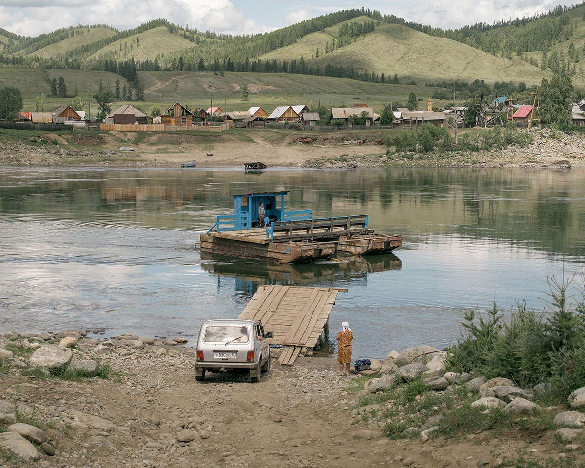 A small ferry boat is the only connection to the village of Old Believers. The Old Believers turned against the reforms of the Patriarch Nikon, who reformed from 1652 texts and rites of Russian Orthodox worship. Therefore, many fled to the most remote areas of Russia. First from the Tsar, later from the Soviets. © Nanna Heitmann/Magnum Photos